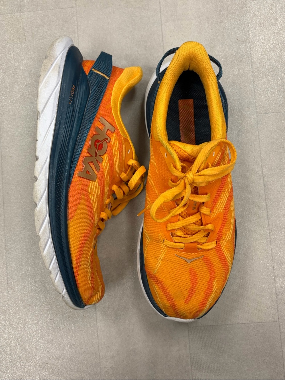 Hoka One One Women’s Orange and Navy Athletic Running Shoes